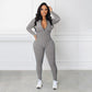 🔥🩱Einfarbiger nahtloser Jumpsuit mit halbem Reißverschluss